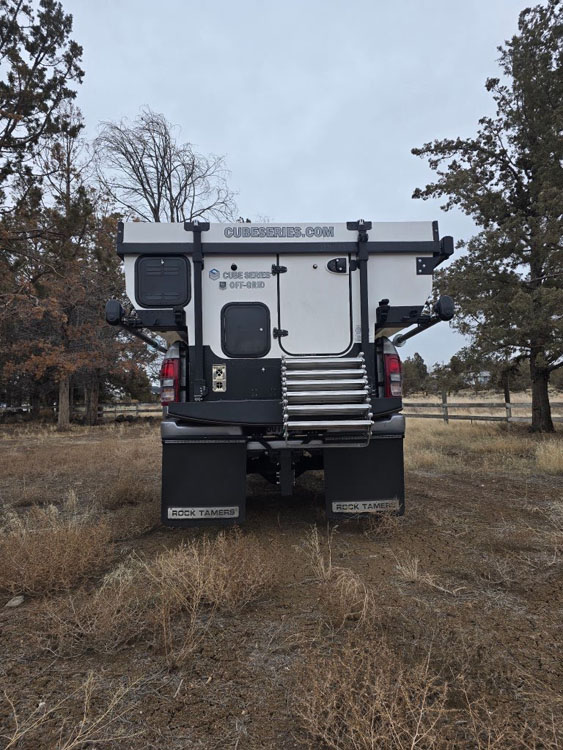 retracted cube series camper from the back