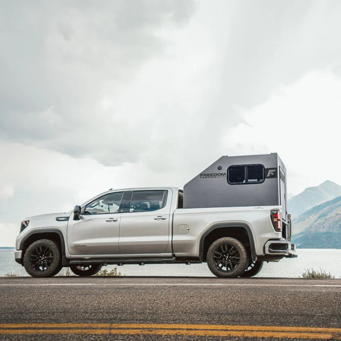 freedom camper on gray truck