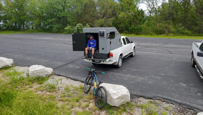 grey freedom campers bicycling