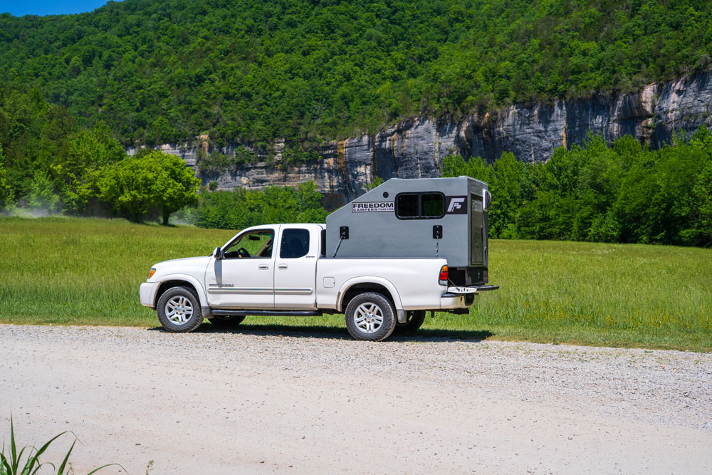 grey freedom campers on white tundra