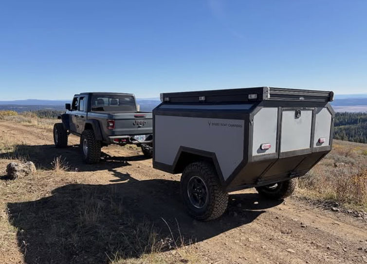 speed goat campers on mountain trail