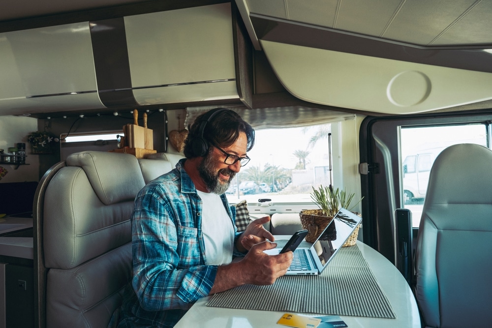 man planning a camping trip