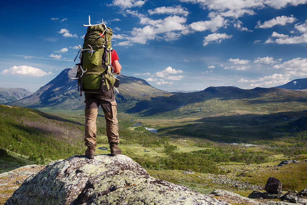 man hiking with a backpack