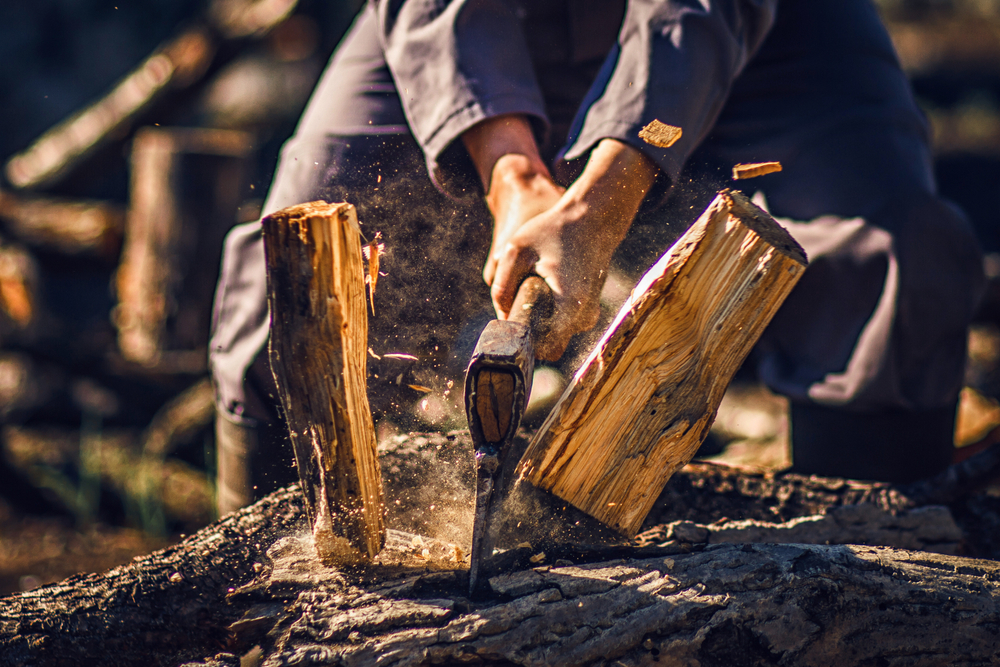 man using an ax