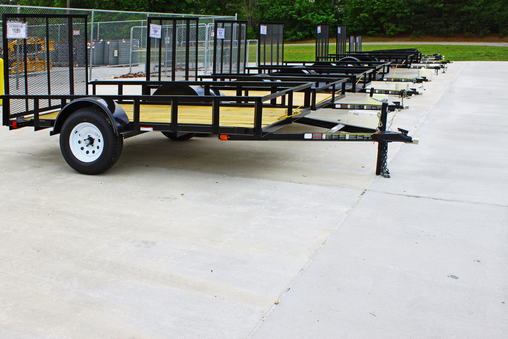 row of flatbed utility trailers