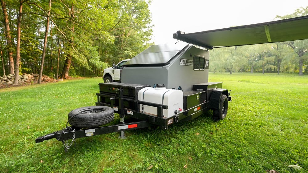 freedom camper with awning out