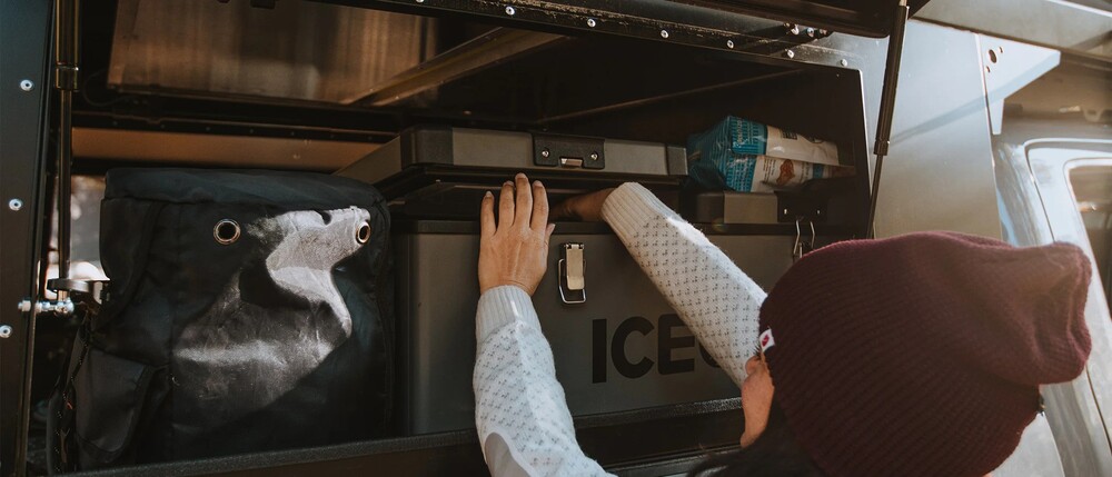 Woman reaching into a ICECO VL60