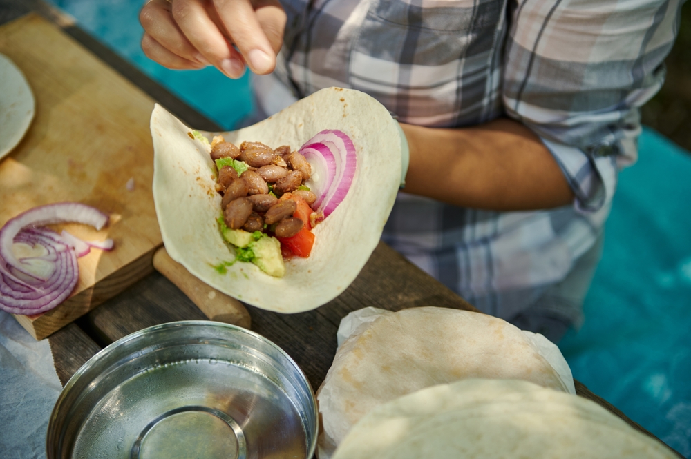 cooking burrito while camping