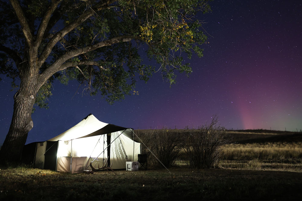 montana canvas bridger tent at night