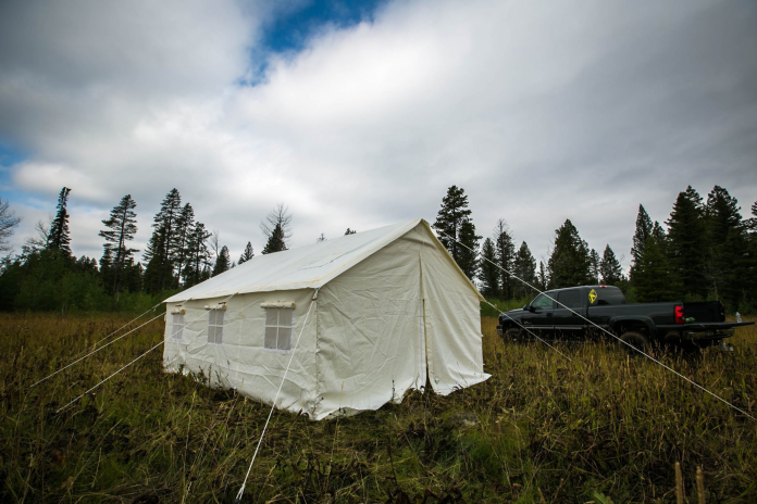 elk mountain wall tent in meadow