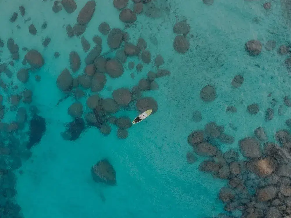 atoll 11 foot paddle board in ocean