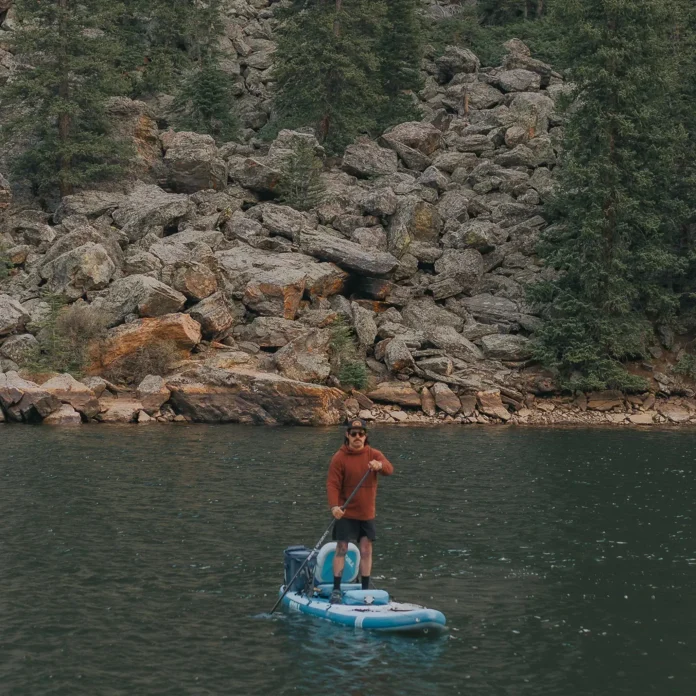 man standing on atoll outrider