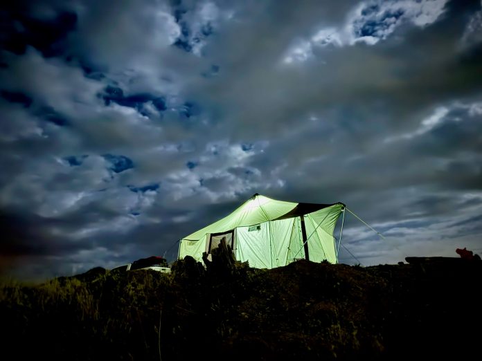 montana canvas bridger tent at night