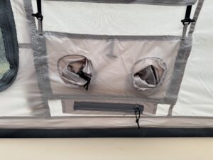 Close-up of two interior storage pouches with a zippered pocket on the Zonkoo Orion tent's inner wall