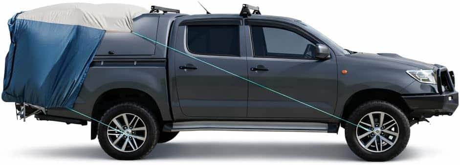 DAC full-size truck bed tent shown in blue and gray fitted over a gray pickup's covered bed, side profile view