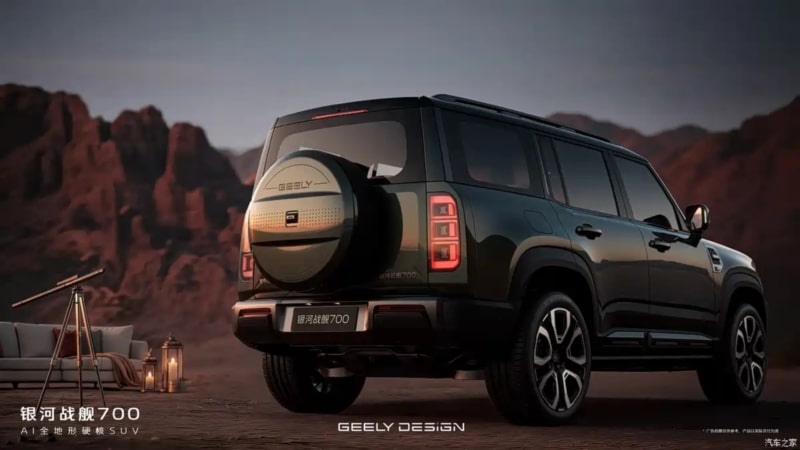 Rear three-quarter view of a black Geely Galaxy Cruiser 700 with spare tire mounted on the tailgate at dusk — manufacturer image