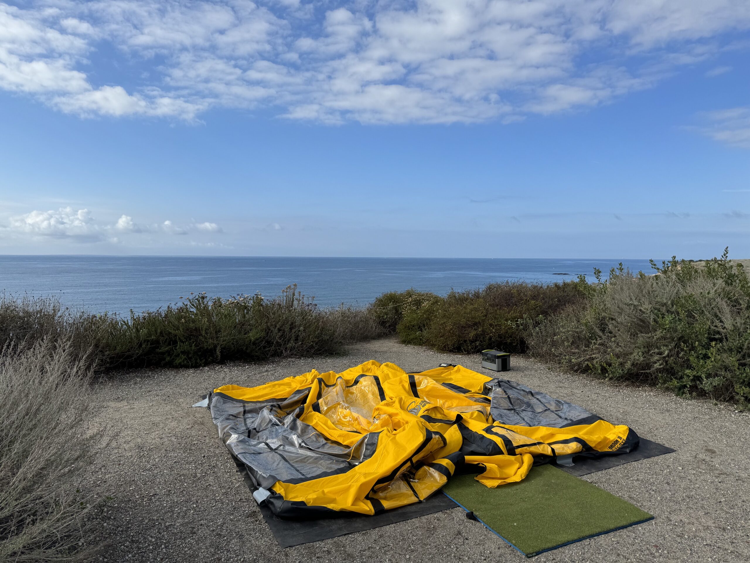 Sonmez London 360 inflatable tent deflated, overlooking the Pacific Ocean