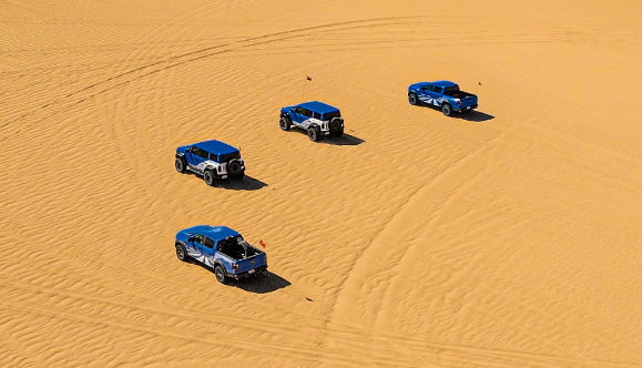 Ford Bronco Raptor and Ranger Raptor staged in the desert for the Ford Raptor Rebelle Rally 2026