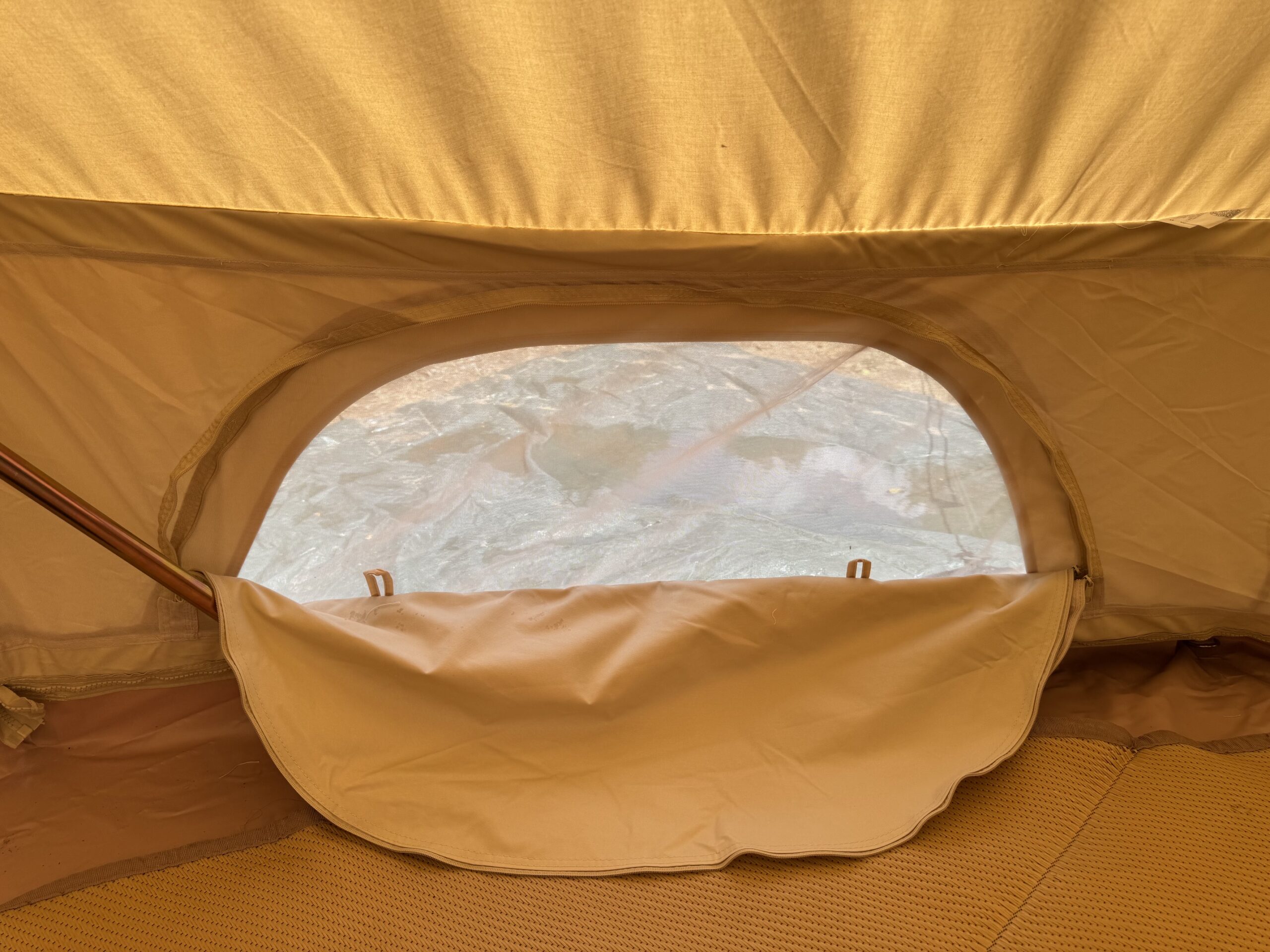 unzipped Stout 5M Bell Tent window improving airflow to stop bell tent condensation