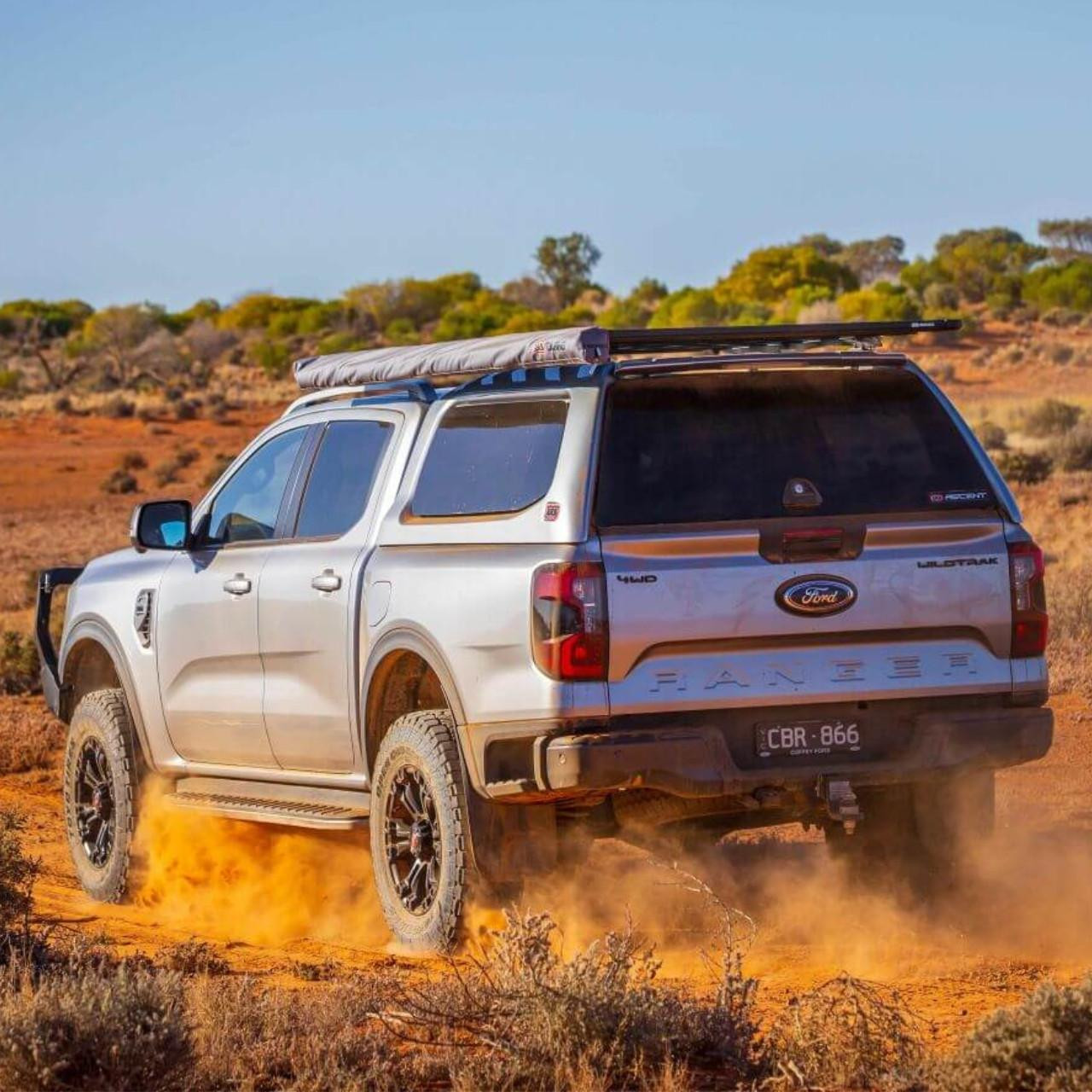 ARB Ascent truck cap shown in Oxford White, Carbonized Grey, and Absolute Black