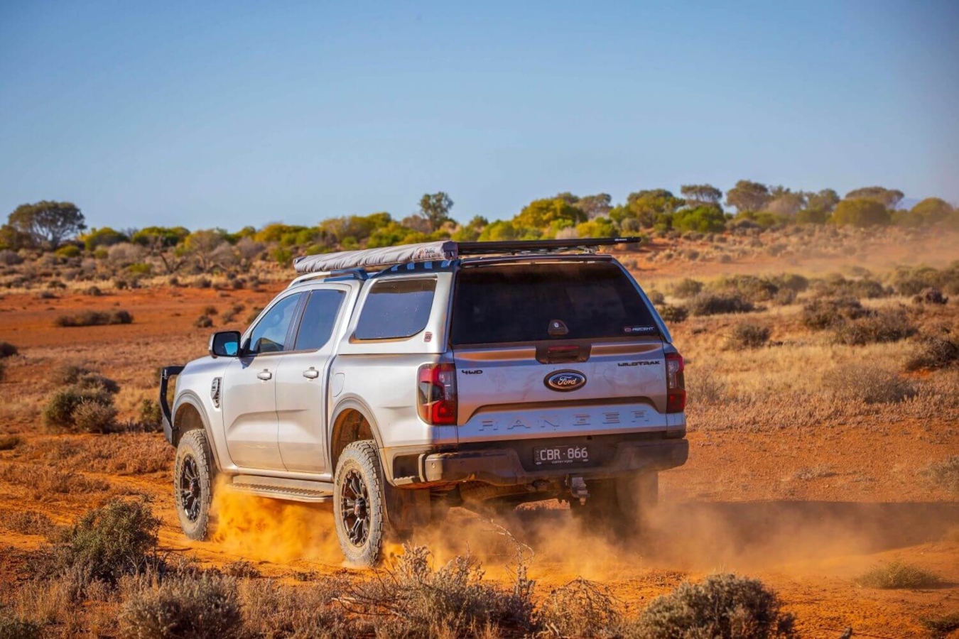 ARB Ascent Ford Ranger camper shell mounted on a silver 2024 Ford Ranger in the desert