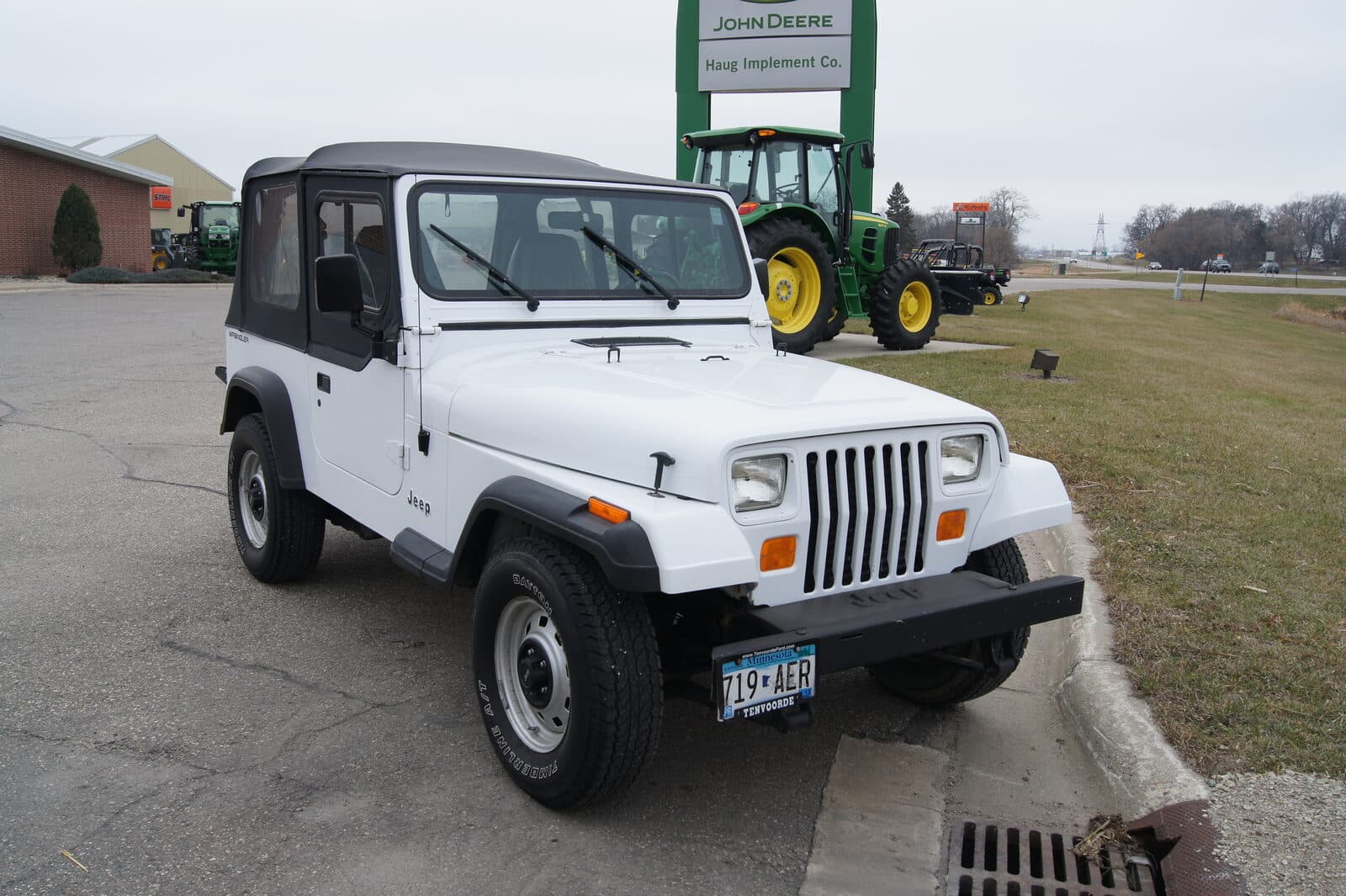 Jeep Wrangler YJ 1994 YJ-generation model with square headlights and a wider track