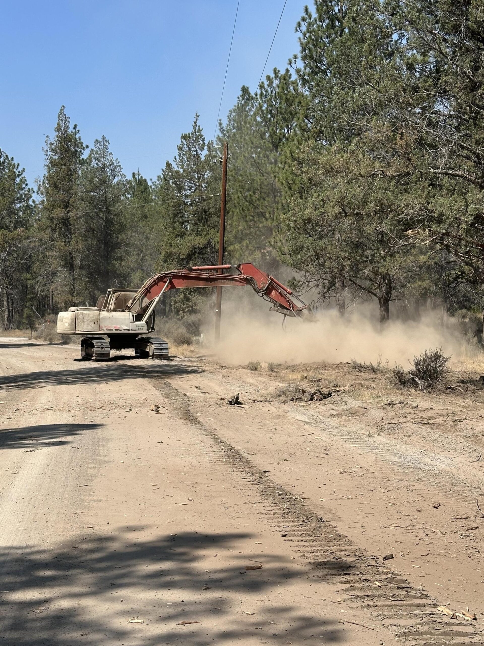 Masticator clearing fuel near Sisters, Oregon, July 26, 2026