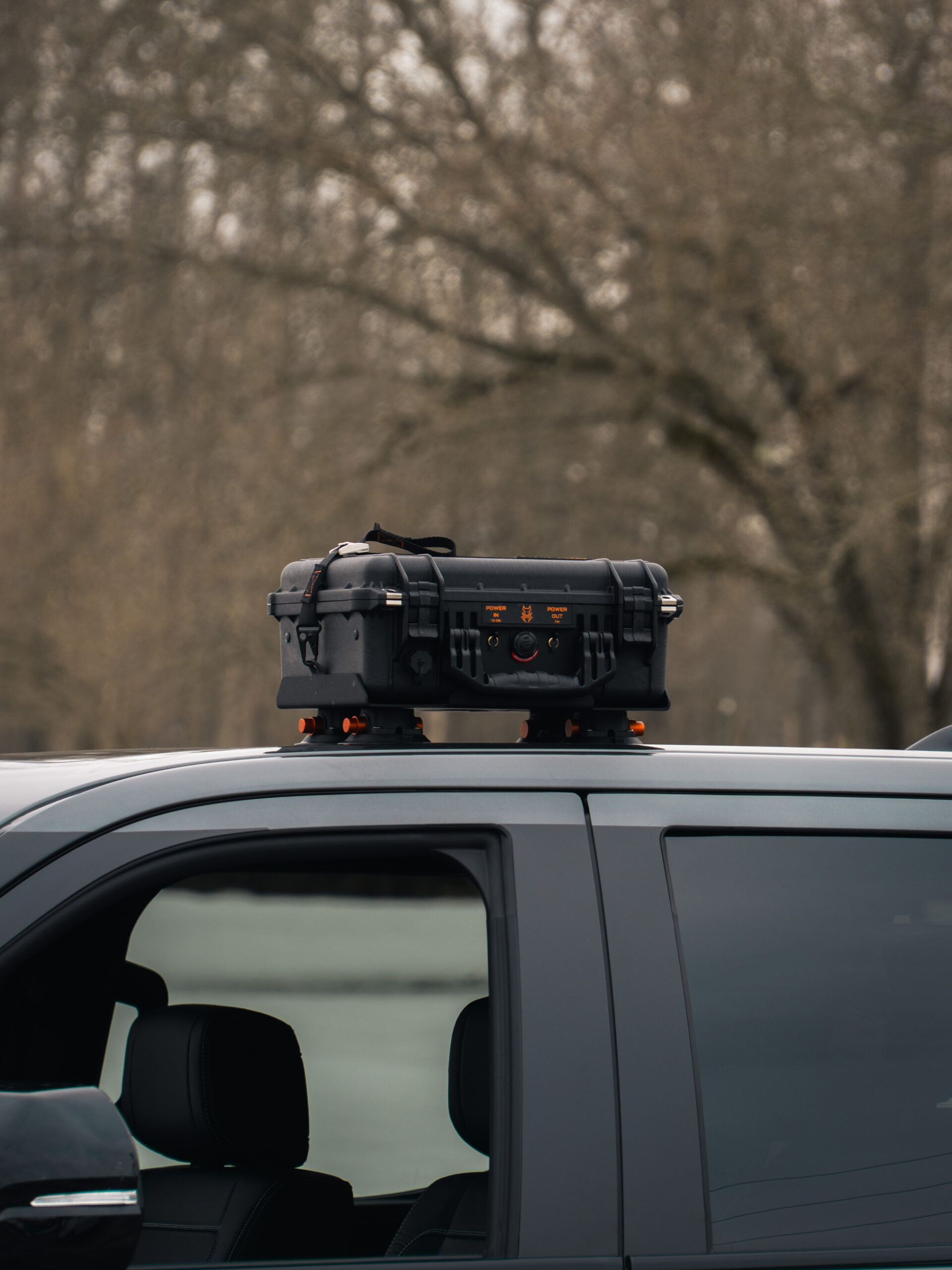 Star-Batt Plus case mounted on a vehicle roof rack using suction-cup mounts