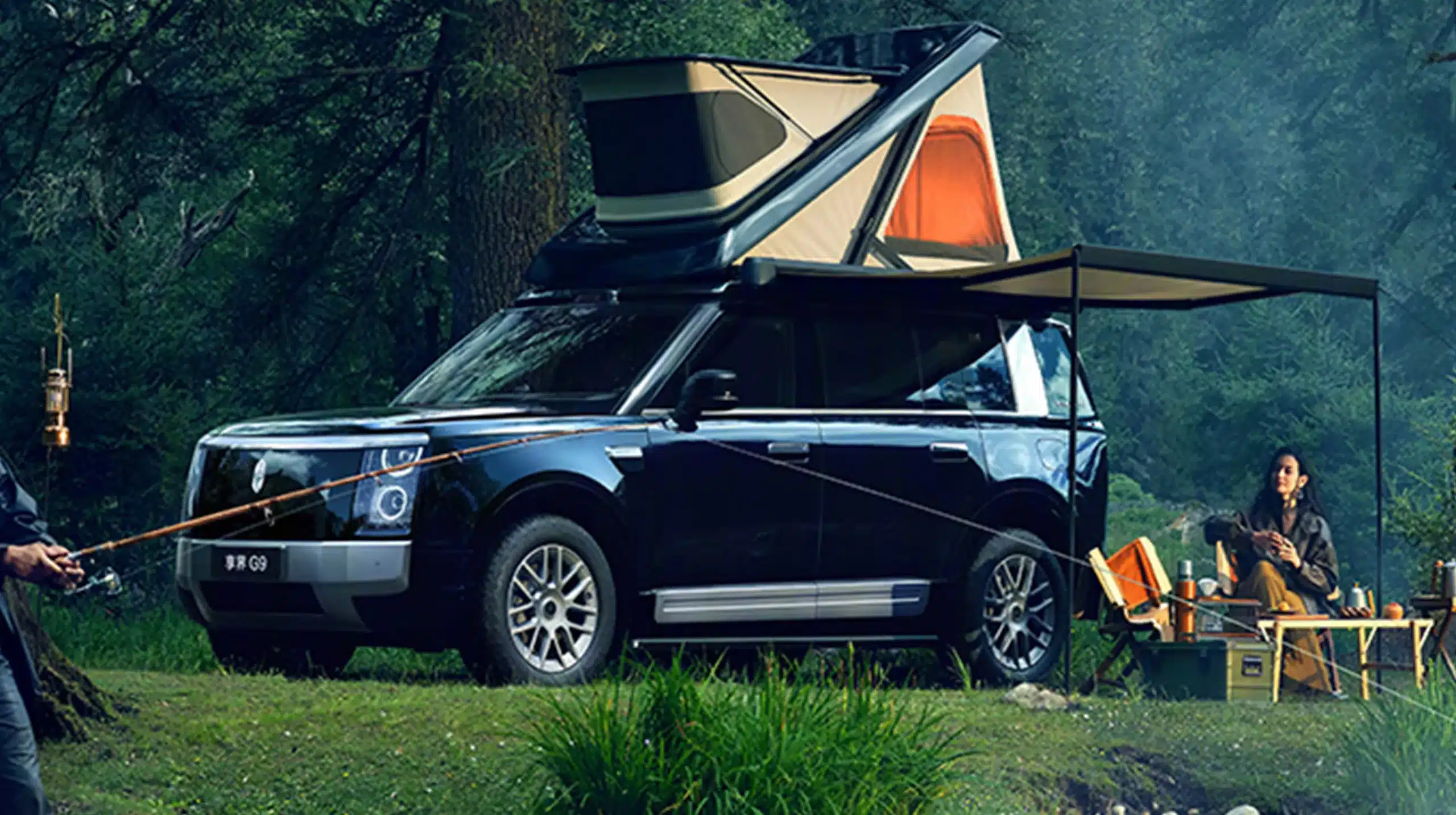 Stelato G9 with its factory rooftop tent and side awning deployed at a forest campsite