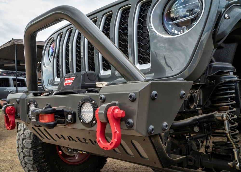 Warn winch shown on the front of a Jeep Wrangler. 