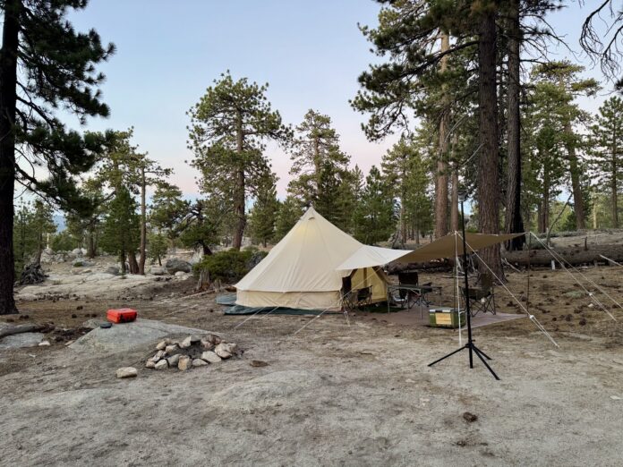 Star-Batt Plus on the ground next to a stout bell tent in Big Bear