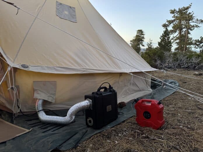 velit-portable-heater-fuel-can-duct Velit portable heater with a red fuel can and warm-air duct beside a canvas tent