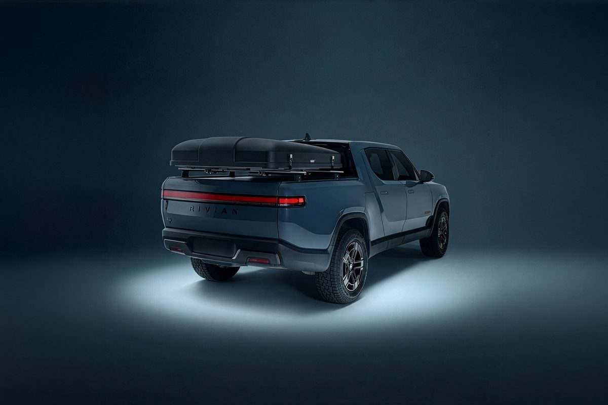 Closed Rivian rooftop tent mounted over the bed of a Rivian R1T
