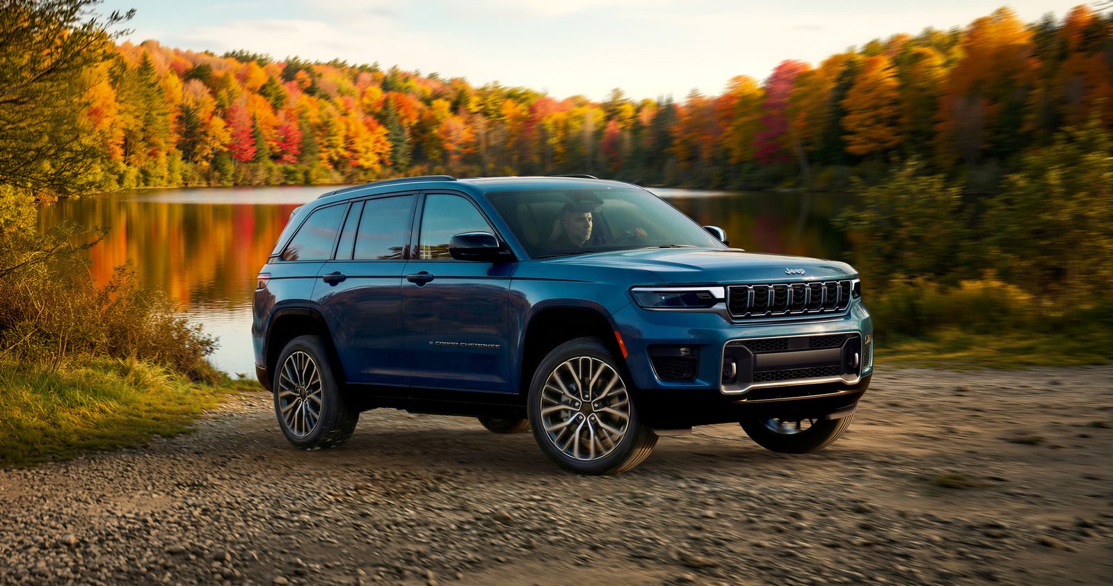 2027 Jeep Grand Cherokee Overland exiting a dirt trail