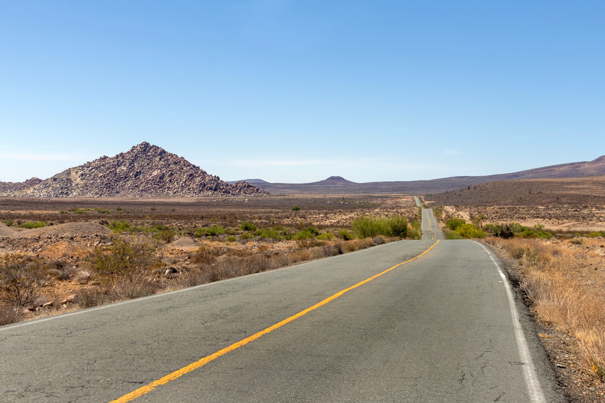 Desert highway in Baja California Sur Two-lane desert highway in Baja California Sur, the kind of road Hurricane Polo rain can flood