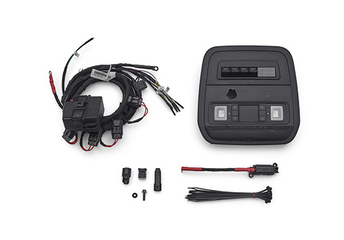 Bronco aux switches kit from Ford, with the overhead switch panel, wiring harness, and install hardware