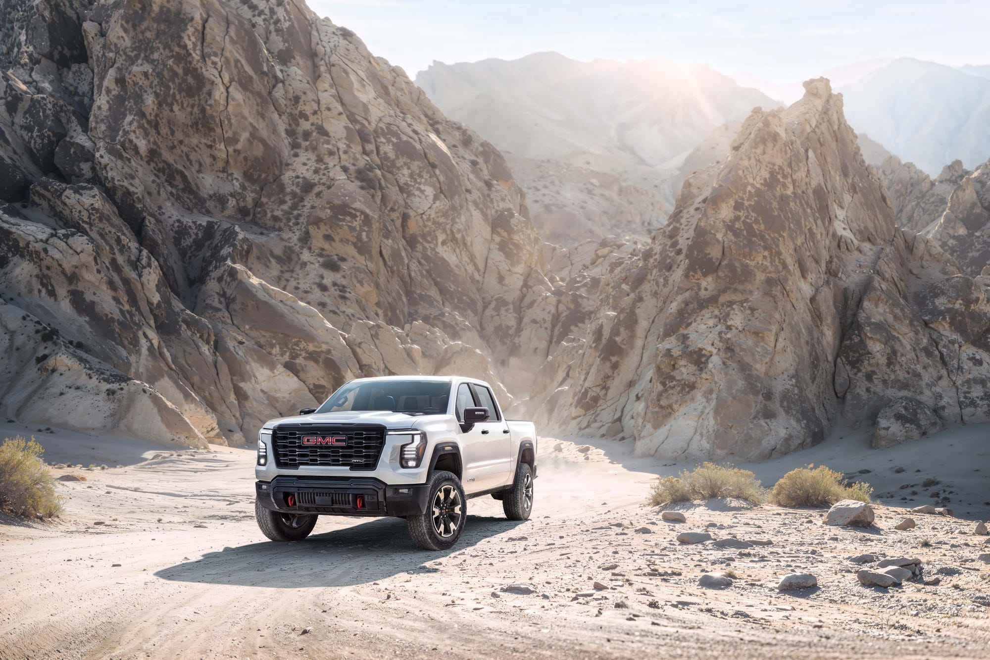 2027 GMC Sierra 1500 AT4 Front three-quarter view of the 2027 GMC Sierra 1500 AT4 pickup