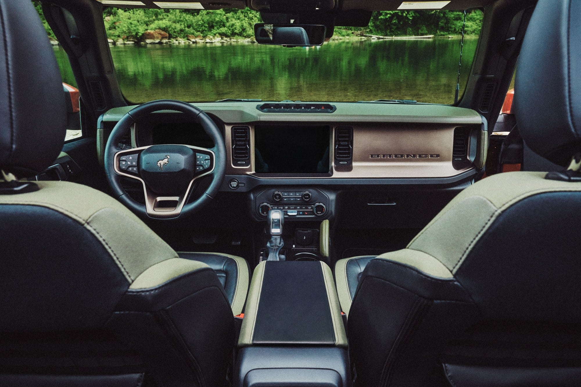 2027 Ford Bronco Filson interior 2027 Ford Bronco Filson interior with two-tone seats and copper dash trim