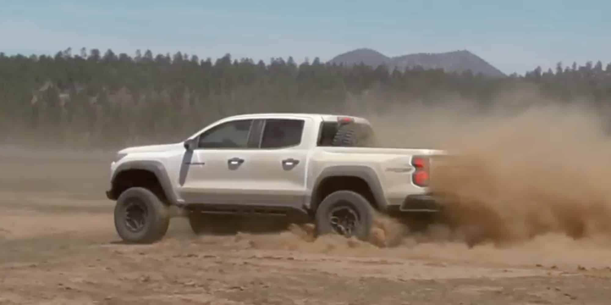 2026 Chevrolet Colorado ZR2 Bison White 2026 Chevrolet Colorado ZR2 Bison kicking up dust on a dirt trail