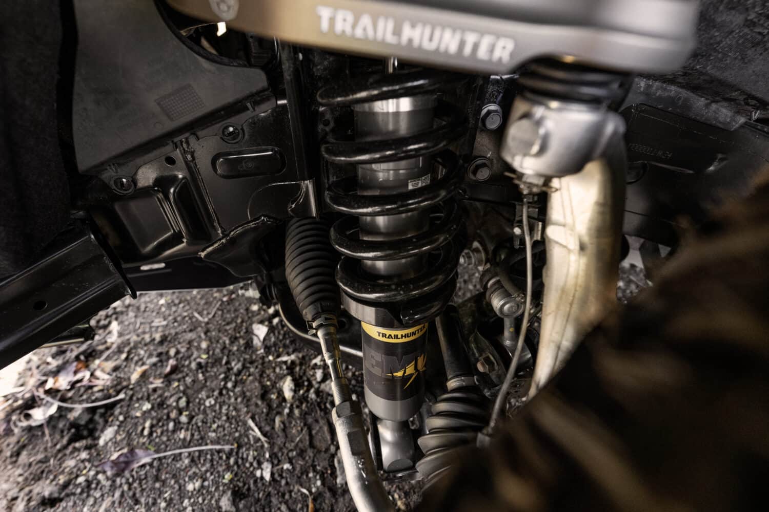 2026 Tacoma Trailhunter front suspension 2026 Toyota Tacoma Trailhunter hybrid front suspension with Trailhunter-branded shocks