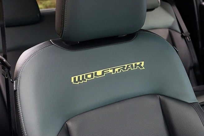 Everest Wolftrak front seat with green Wolftrak embroidery