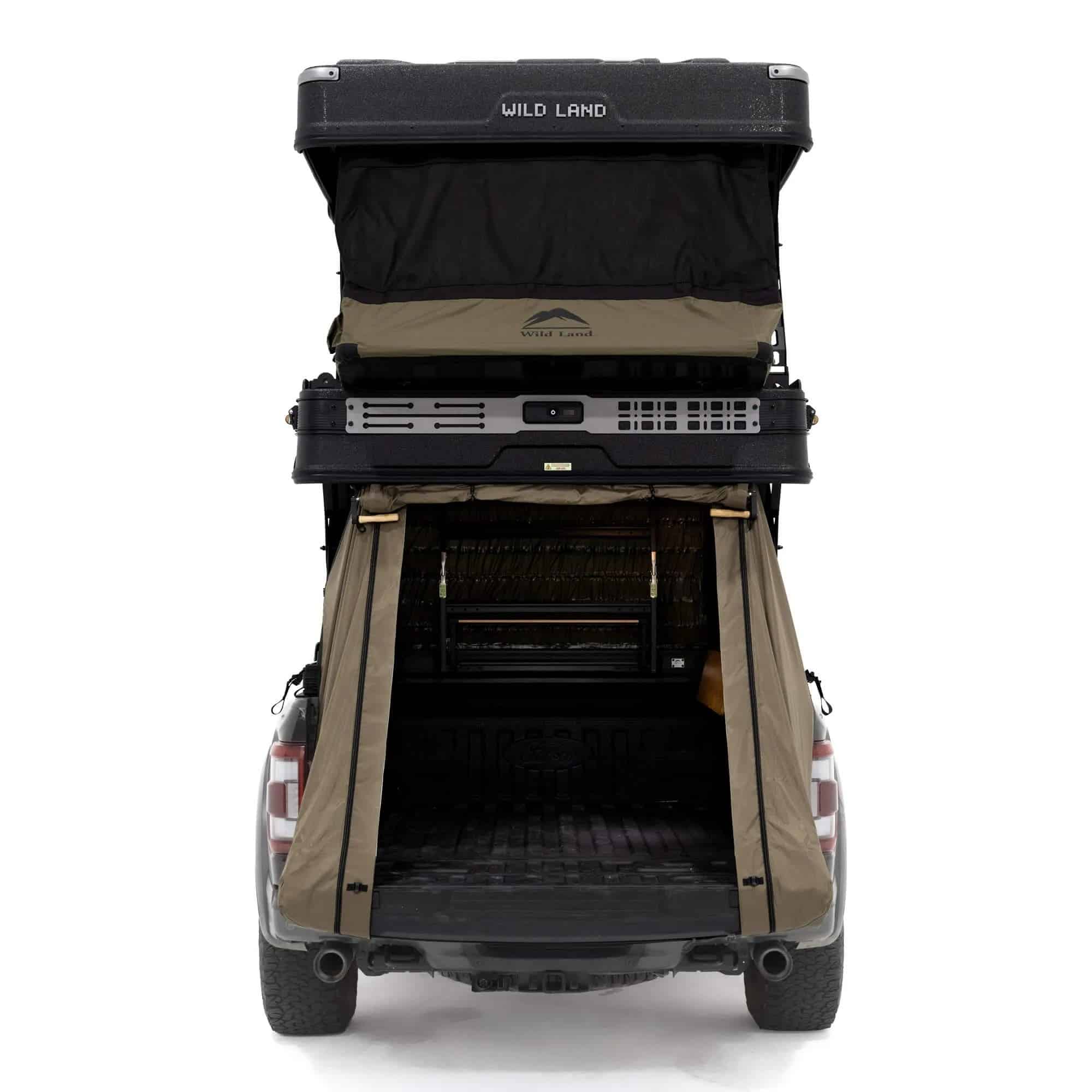 Rear view of the Wingman X deployed on a pickup, with the lower level enclosing the open truck bed
