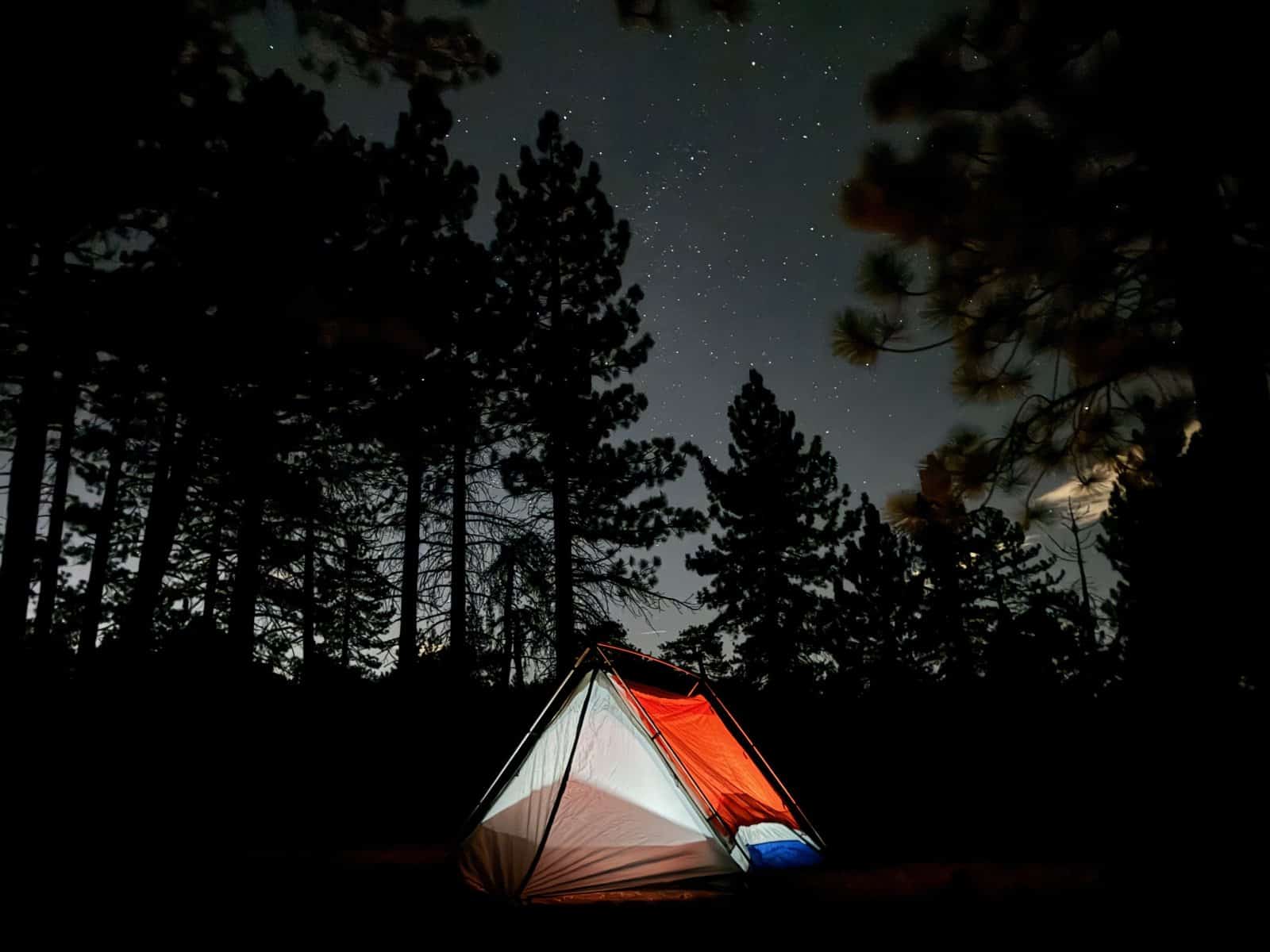 Sky View XL stargazing tent lit from inside under a starry Big Bear sky