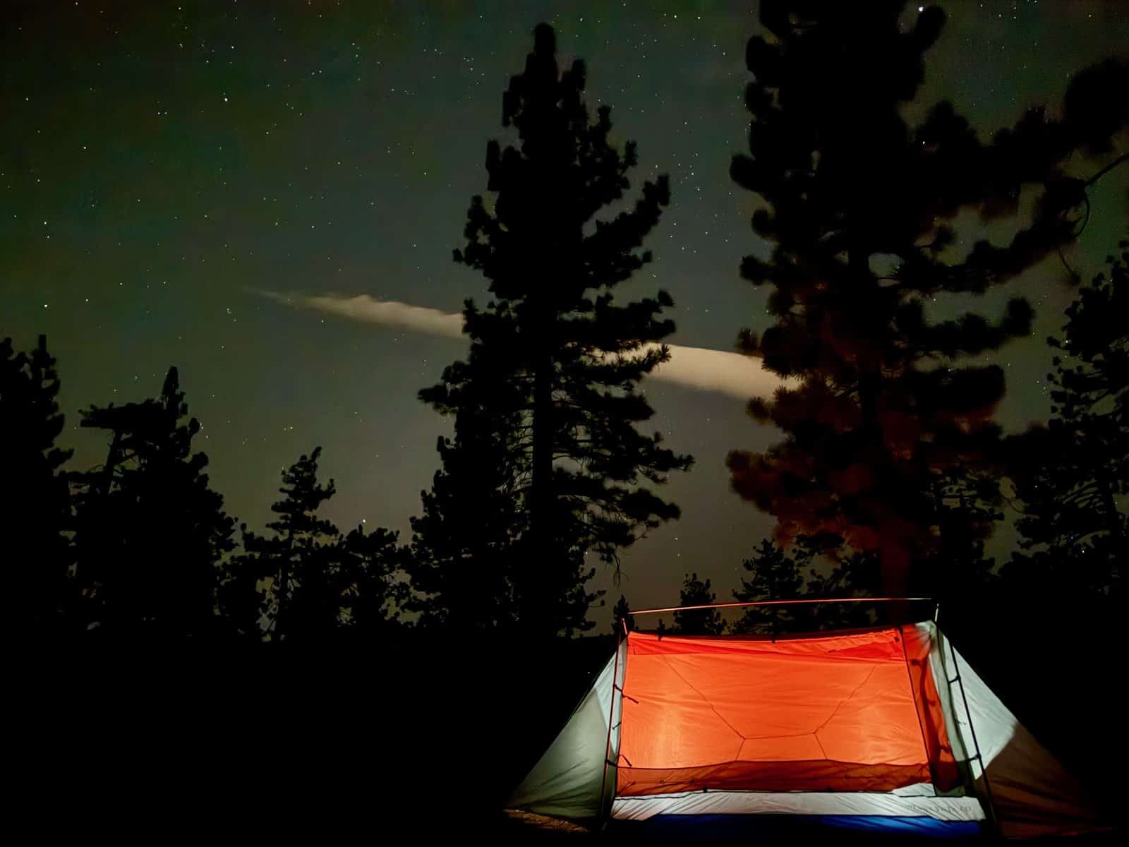 Sky View XL Glowing Under the Night Sky Sky View XL glowing orange beneath pine trees and a starry Big Bear sky