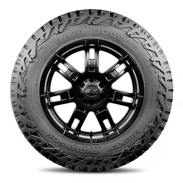 Baja Boss A/T sidewall view Sidewall view of the Mickey Thompson Baja Boss A/T tire mounted on a black wheel