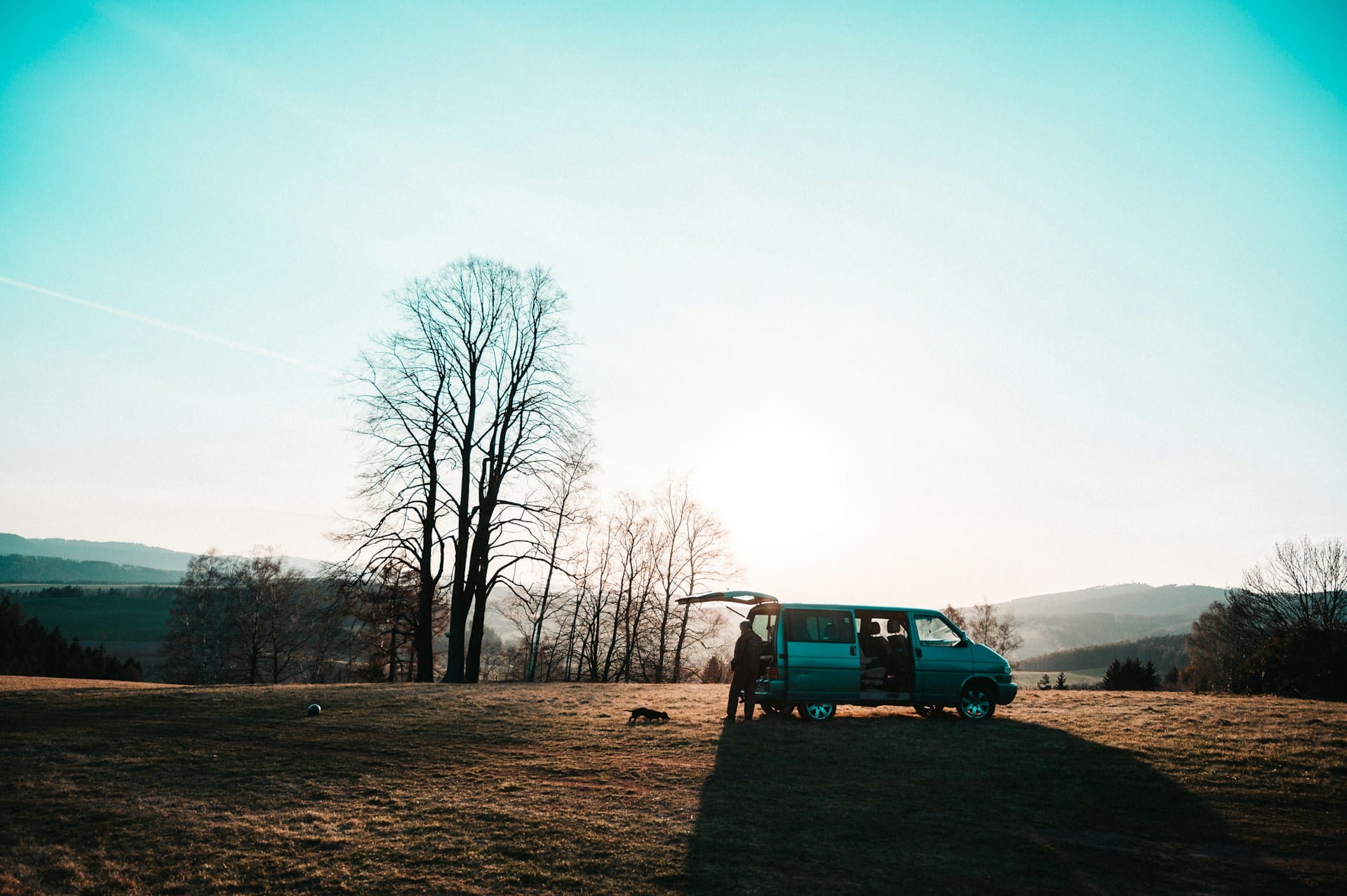 small camper van in a field