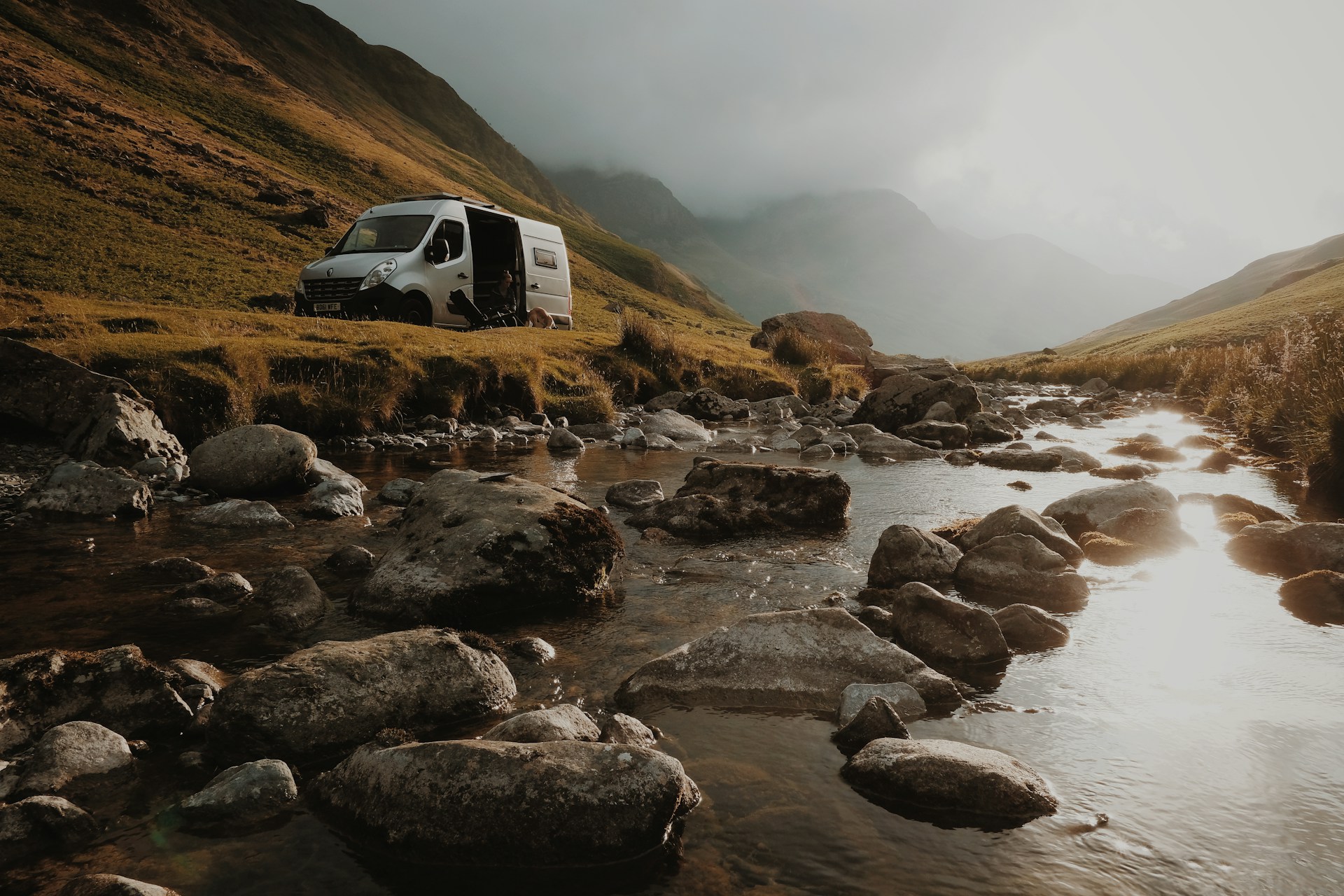 white camper van near river