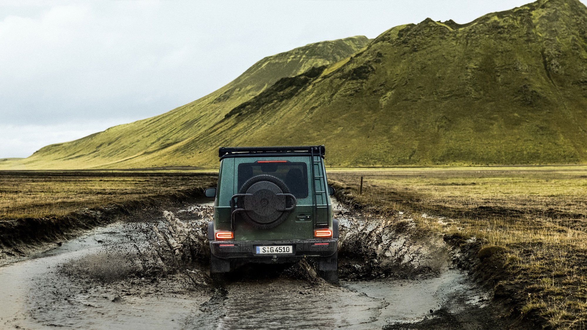 Current G-Class river crossing Current full-size Mercedes G-Class splashing through a muddy stream crossing in Iceland