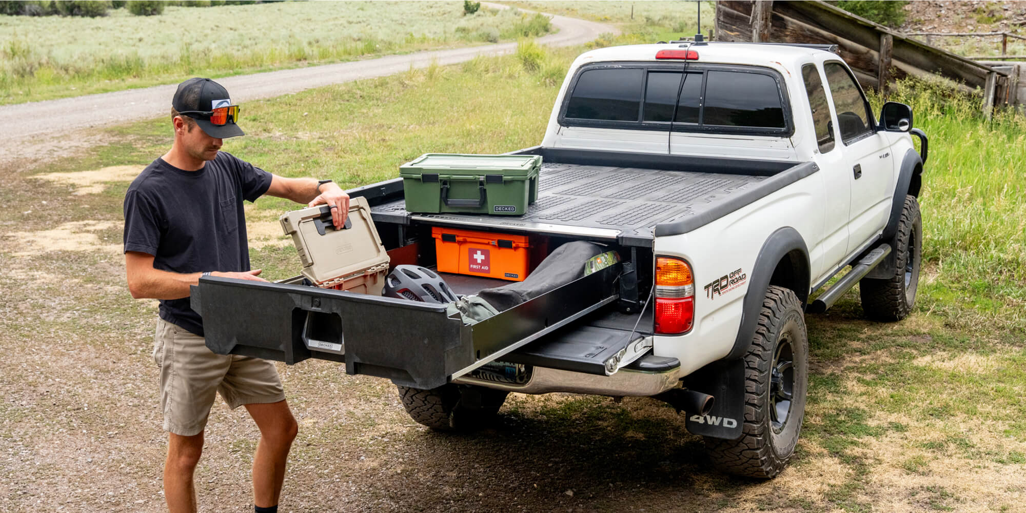 DECKED Tacoma YT12 drawer system in a white first gen Toyota Tacoma