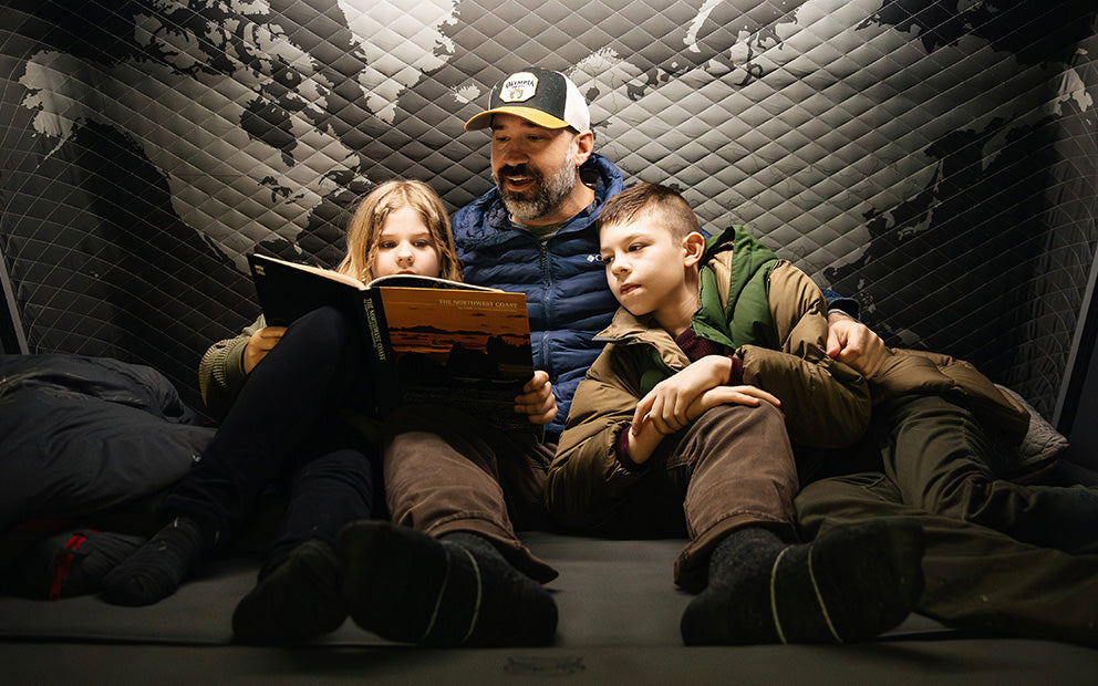 Parent and two kids inside an iKamper Skycamp with the quilted insulated lining Parent and two kids inside an iKamper Skycamp with the quilted insulated lining
